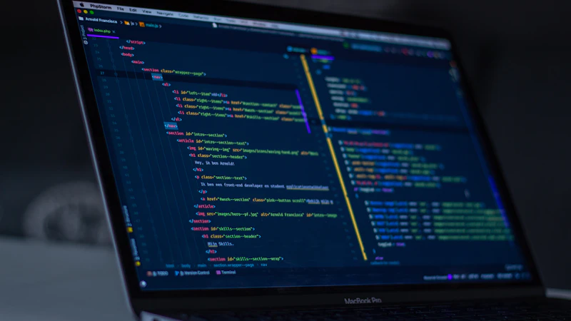 MacBook Pro displaying programming code