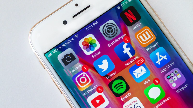 Gold iPhone with its screen turned on