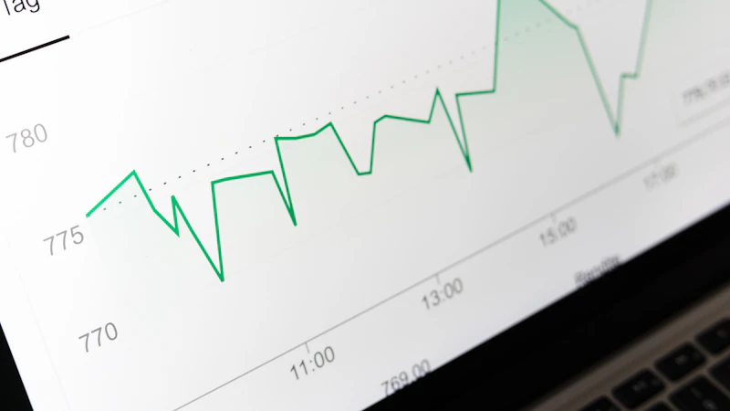 Rising chart displayed on a laptop screen