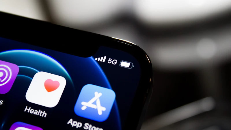 Black iPhone displaying a grid of app icons