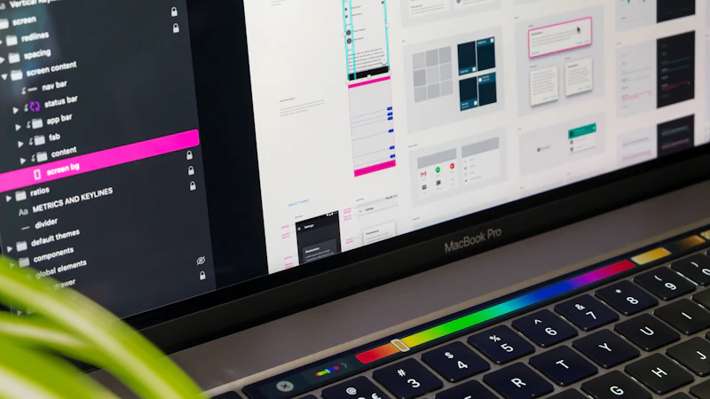 MacBook Pro displaying a screen of app icons
